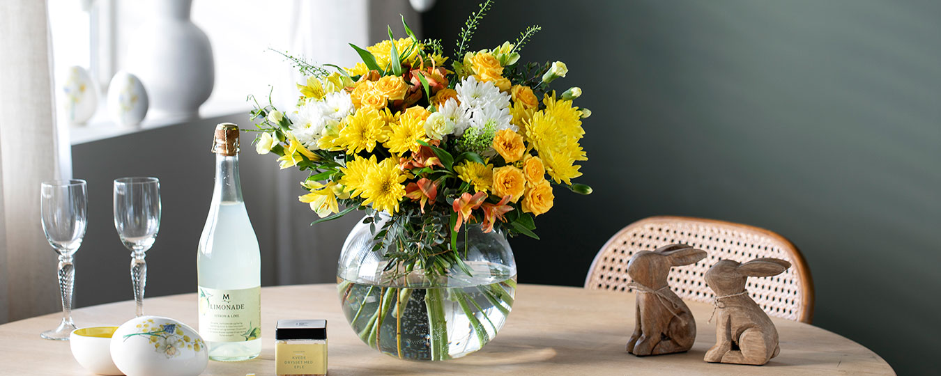 Interiør- og blomsterbilde med klikkbare elementer